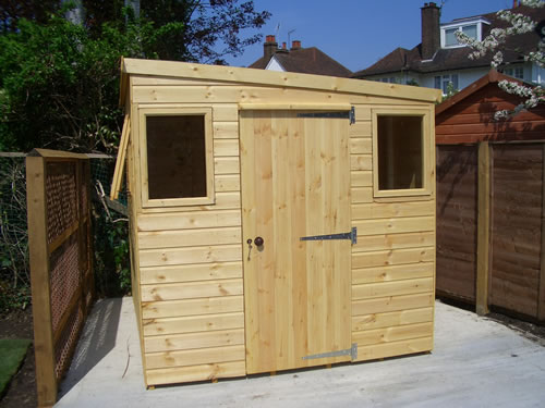 pent roof shed with door in the gable end
