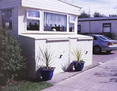 Two Asgard annexe metal storage units placed side by side